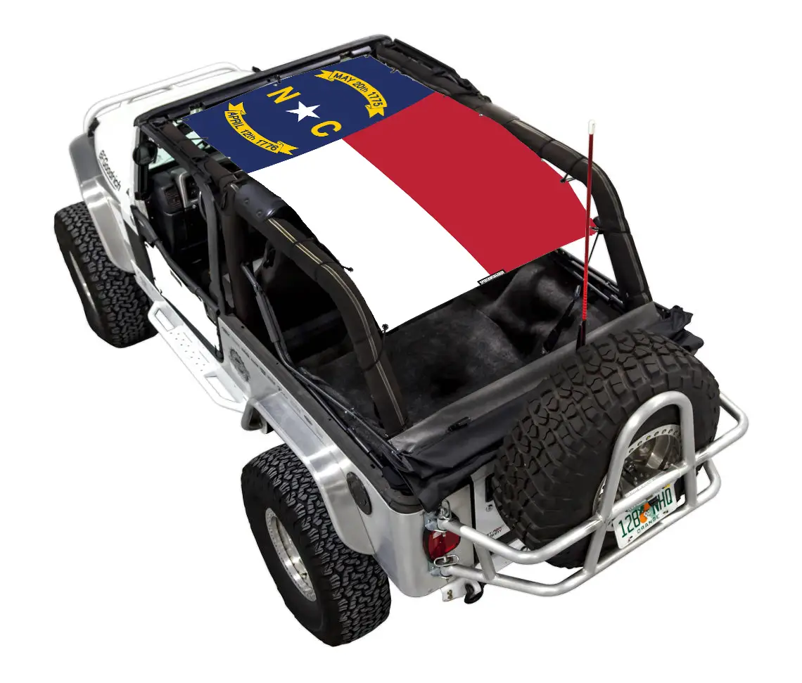 SpiderWebShade sun shade for Jeep Wrangler LJ (2004–2006); stock printed shade top with flag design