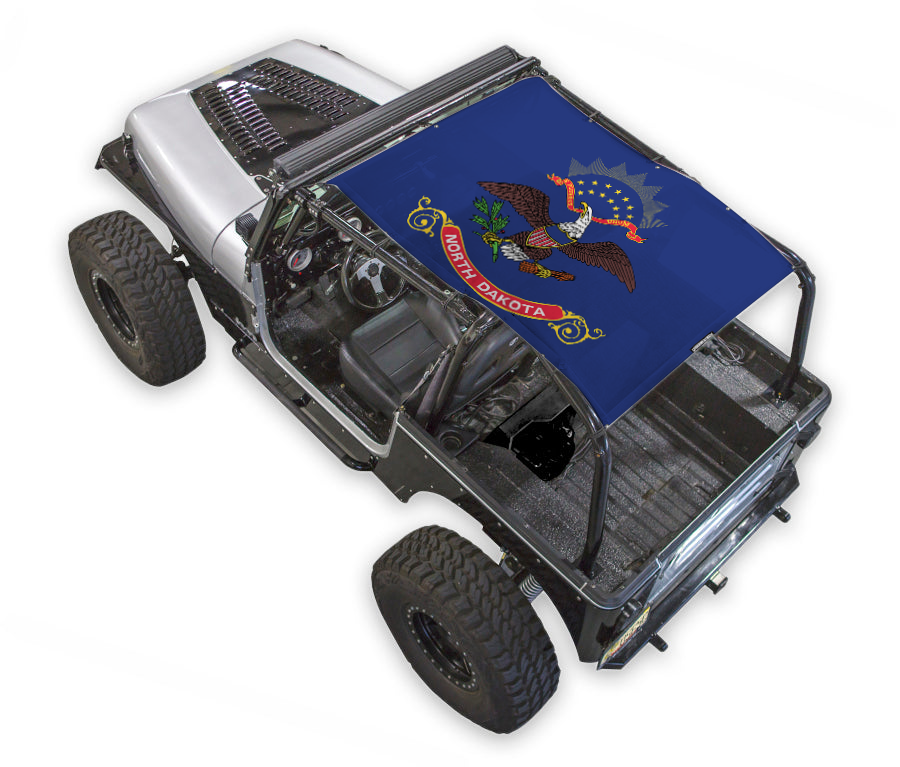 Jeep Wrangler YJ sun shade top by SpiderWebShade; blue printed shade featuring the North Dakota state flag.