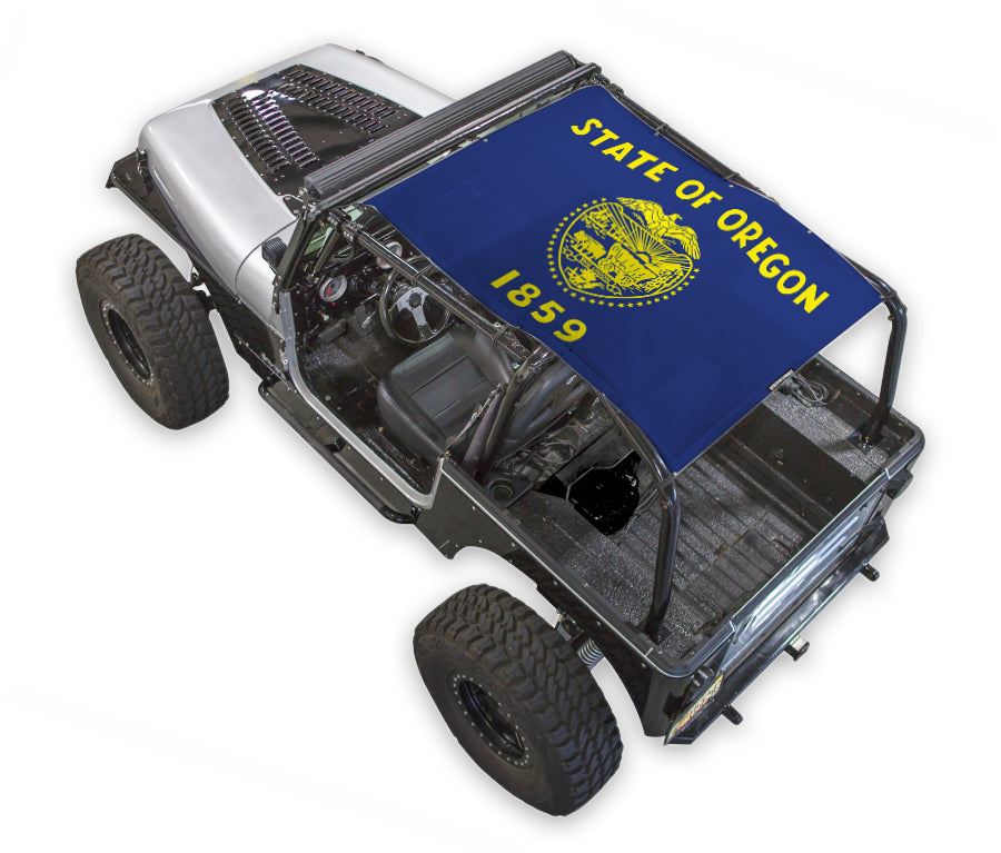 Sun shade top for Jeep Wrangler YJ by SPIDERWEBSHADE; blue printed Oregon state seal design.