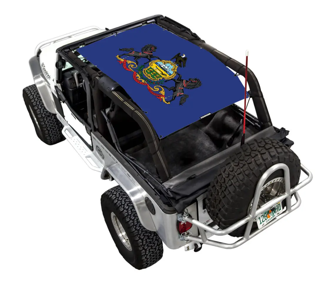 Sun shade top SpiderWebShade for Jeep Wrangler LJ 2004–2006, blue stock-printed design with crest motif.