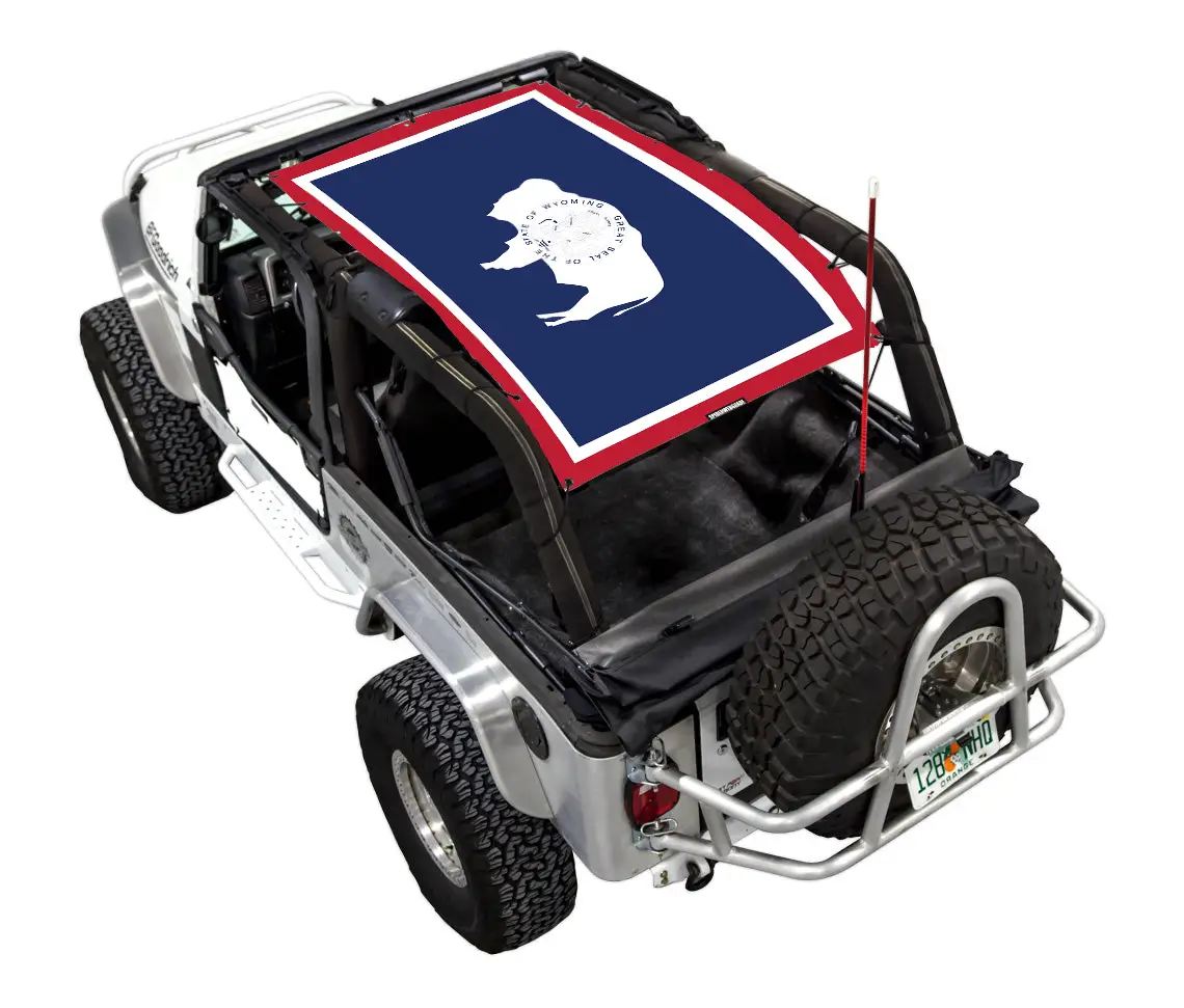 Sun shade for Jeep Wrangler LJ 2004–2006 by SPIDERWEBSHADE; stock printed blue field with white emblem and red border.