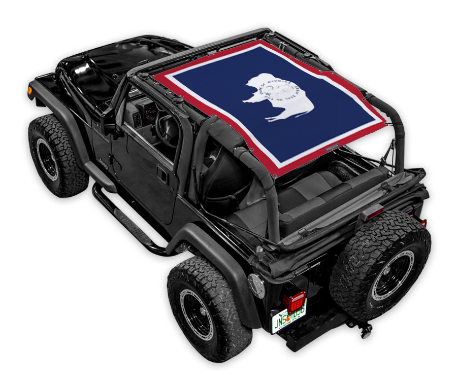 Sun shade top for Jeep Wrangler TJ by SPIDERWEBSHADE; blue printed shade with white buffalo emblem.