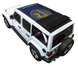 Sun Shade by SpiderWebShade for Jeep Wrangler JLU Sky One Touch Top; blue printed shade top on white Jeep.