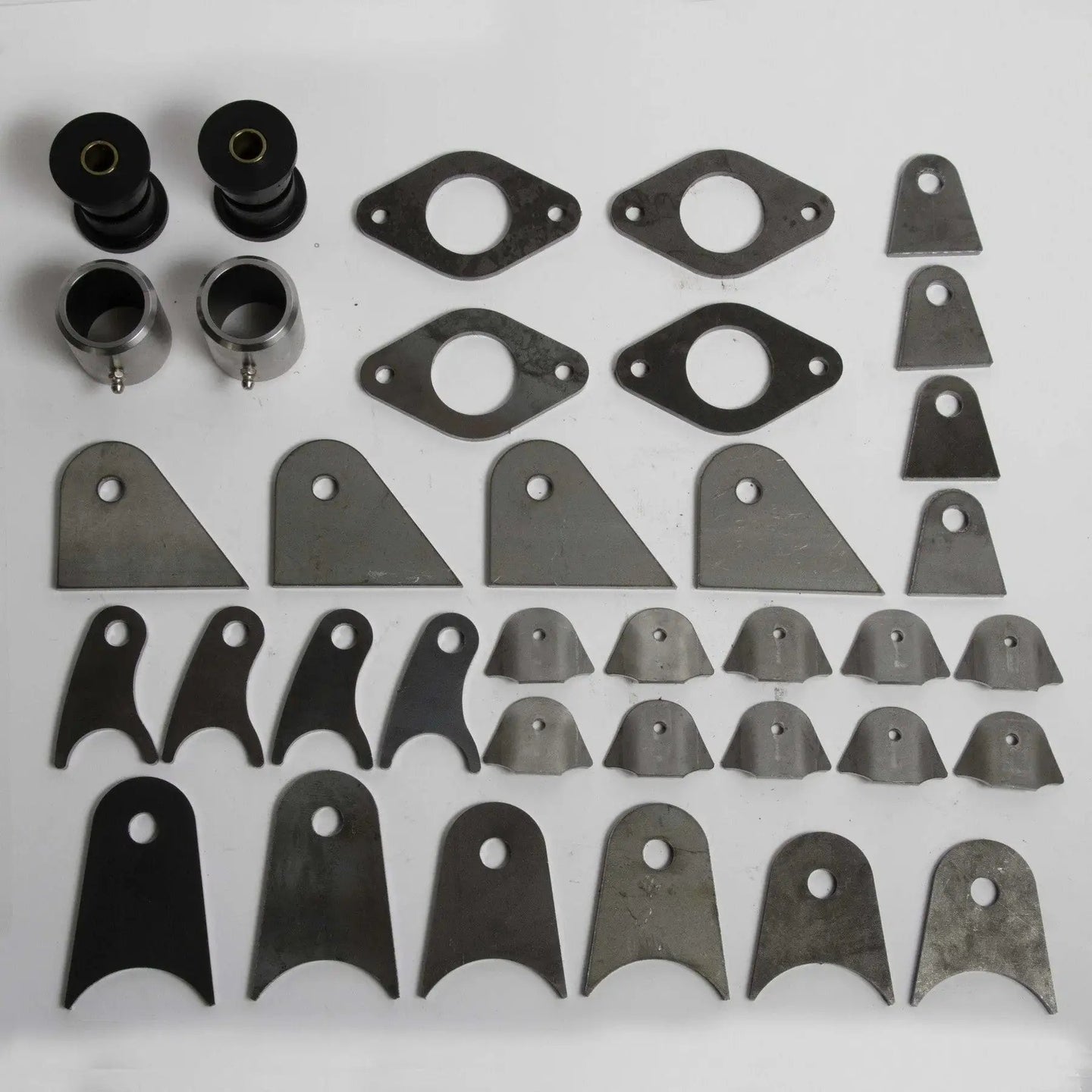 Skinny Pedal Racing TMR Smith Pack – DIY Starter Kit with 2 poly bushings & assorted mounting tabs, spacers, plates