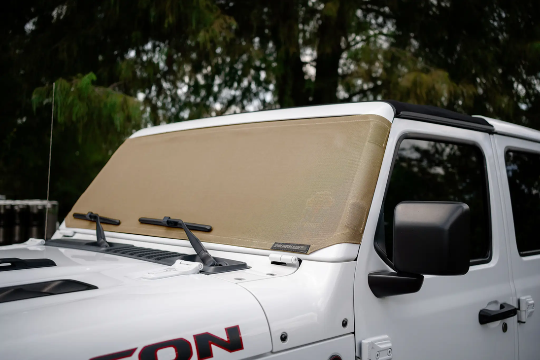 Solar shade for Jeep Wrangler and Gladiator by SpiderWebShade; tan shade on white vehicle