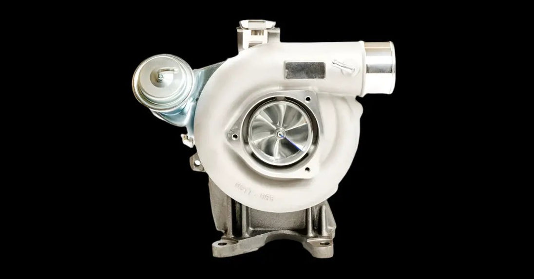 Duramax LB7 TTS Gen2 64/64 Towmaster turbocharger Titan Turbo Service; white compressor housing, turbine wheel visible