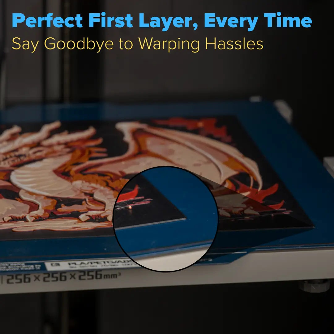 Numakers IceGrip Build Plate on blue 3D printer bed with dragon artwork visible
