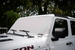 Solar shade by SpiderWebShade for Jeep Wrangler and Gladiator (2007–2026) on a white Jeep windshield