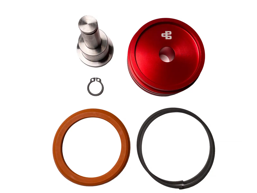 Power Driven Diesel Billet Low/Reverse Servo red anodized housing with piston, snap ring, orange and black seals