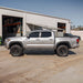 2.0 IFP Coilovers Toyota Tacoma TRD Off Road pickup, silver, near warehouse