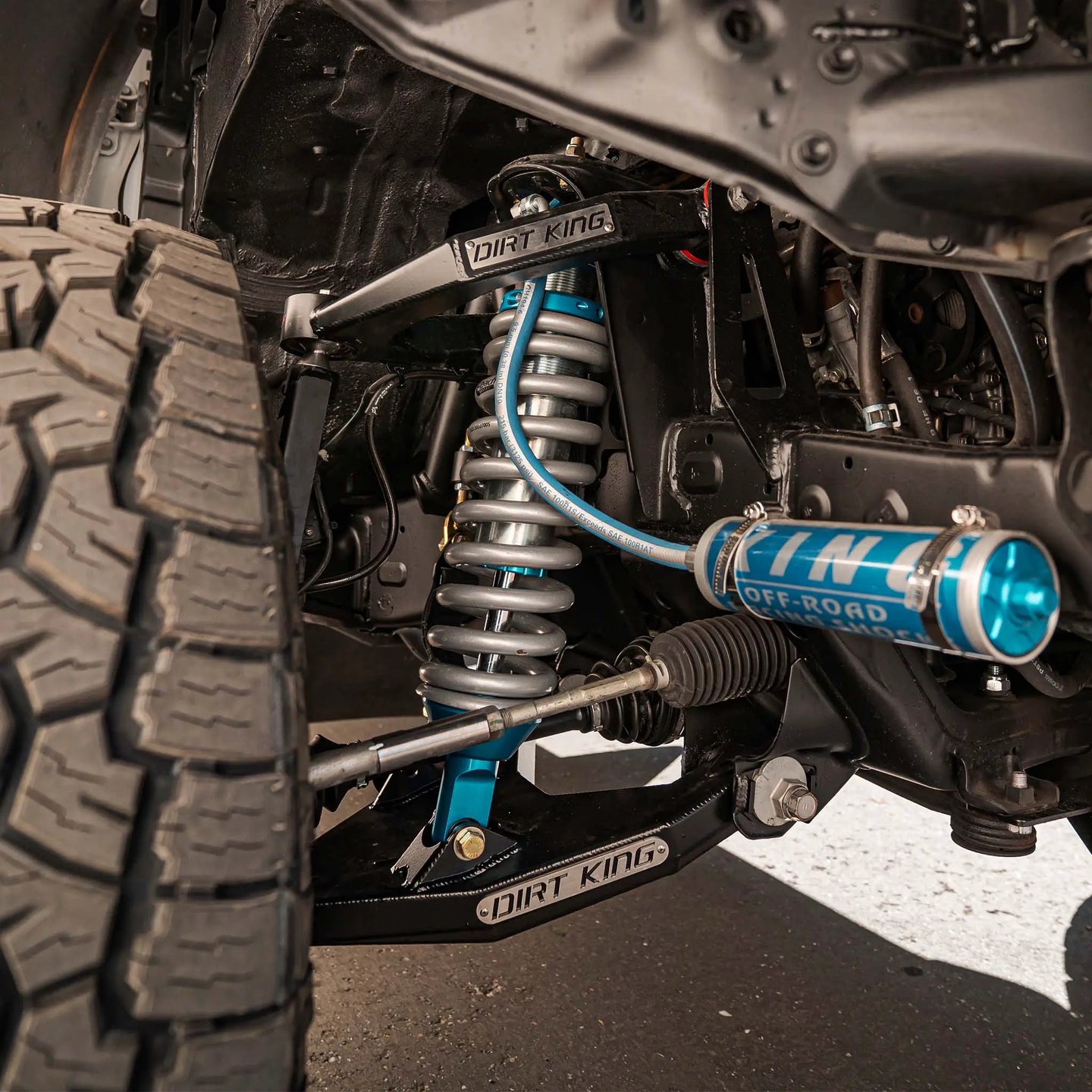 Dirt King Long Travel Kit Toyota blue coilover shocks and suspension components