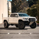 Dirt King Long Travel Kit Toyota Tacoma lifted with front bumper featuring LED lights