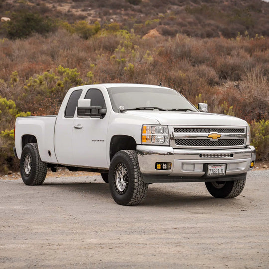 MT PreRunner Kit for Chevy Silverado front end view, white truck with chrome grille and Chevrolet bowtie