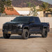 2.0 IFP Coilovers Dirt King Toyota Tundra front view, black pickup with TRD badge