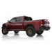 Long Travel Kit Dirt King for Ram 1500 Rebel red pickup with Dirt King logo on rear window