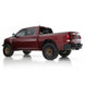 Long Travel Kit Dirt King for Ram 1500 Rebel red pickup with Dirt King logo on rear window