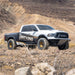 Dirt King Long Travel Kit Ram pickup truck with Dirt King Fabrication graphics