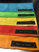 Retractable microfiber towels set of 5 by Revlock Race Supplies in blue, green, yellow, orange, and red