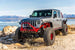 Artec Nighthawk Front Bumper with Aluminum Skid for JK/JL/JT - red bumper on gray off-road SUV