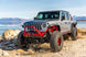 Artec Nighthawk Front Bumper with Aluminum Skid for JK/JL/JT - red bumper on gray off-road SUV
