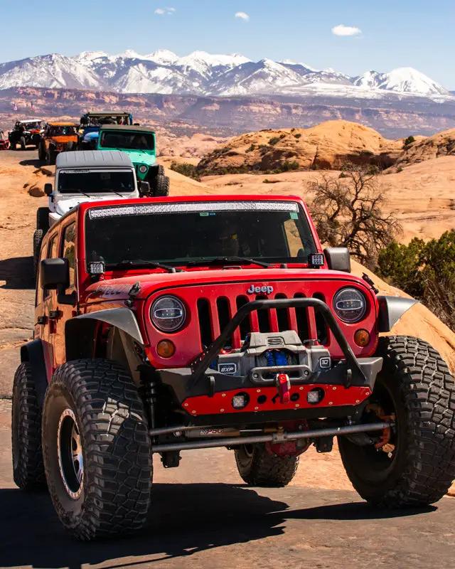 Nighthawk Stinger Front Bumper w Aluminum Skid Artec Industries for JK/JL/JT on red Jeep Wrangler in desert