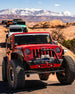Nighthawk Stinger Front Bumper w Aluminum Skid Artec Industries for JK/JL/JT on red Jeep Wrangler in desert