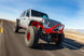 Nighthawk Stinger Front Bumper with Aluminum Skid for JK/JL/JT — Artec Industries, red bumper on white Jeep